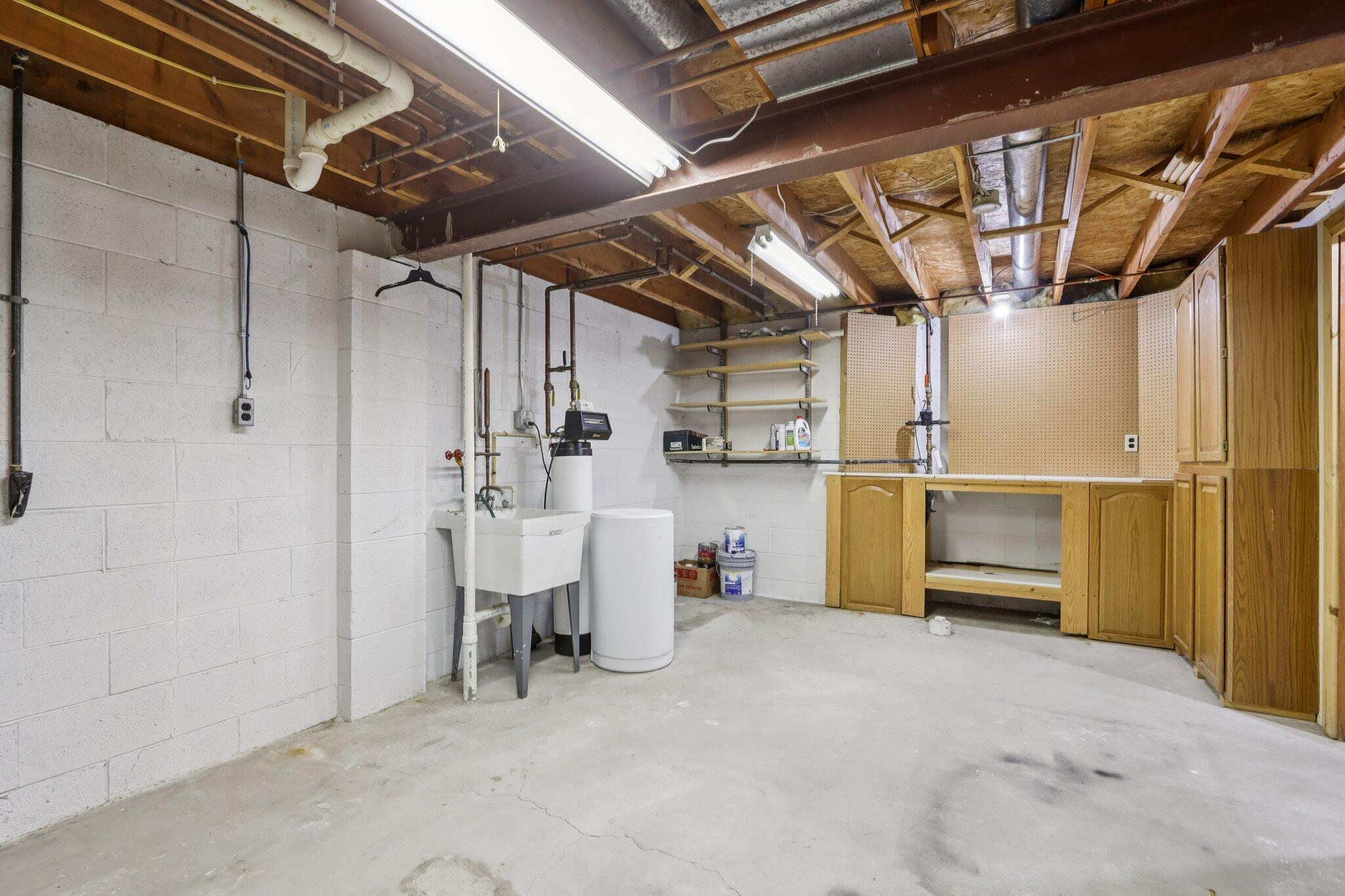 W178-n9743 Riversbend Circle East Germantown, WI 53022 - Photo 40 of 48 Workbench/Storage Area