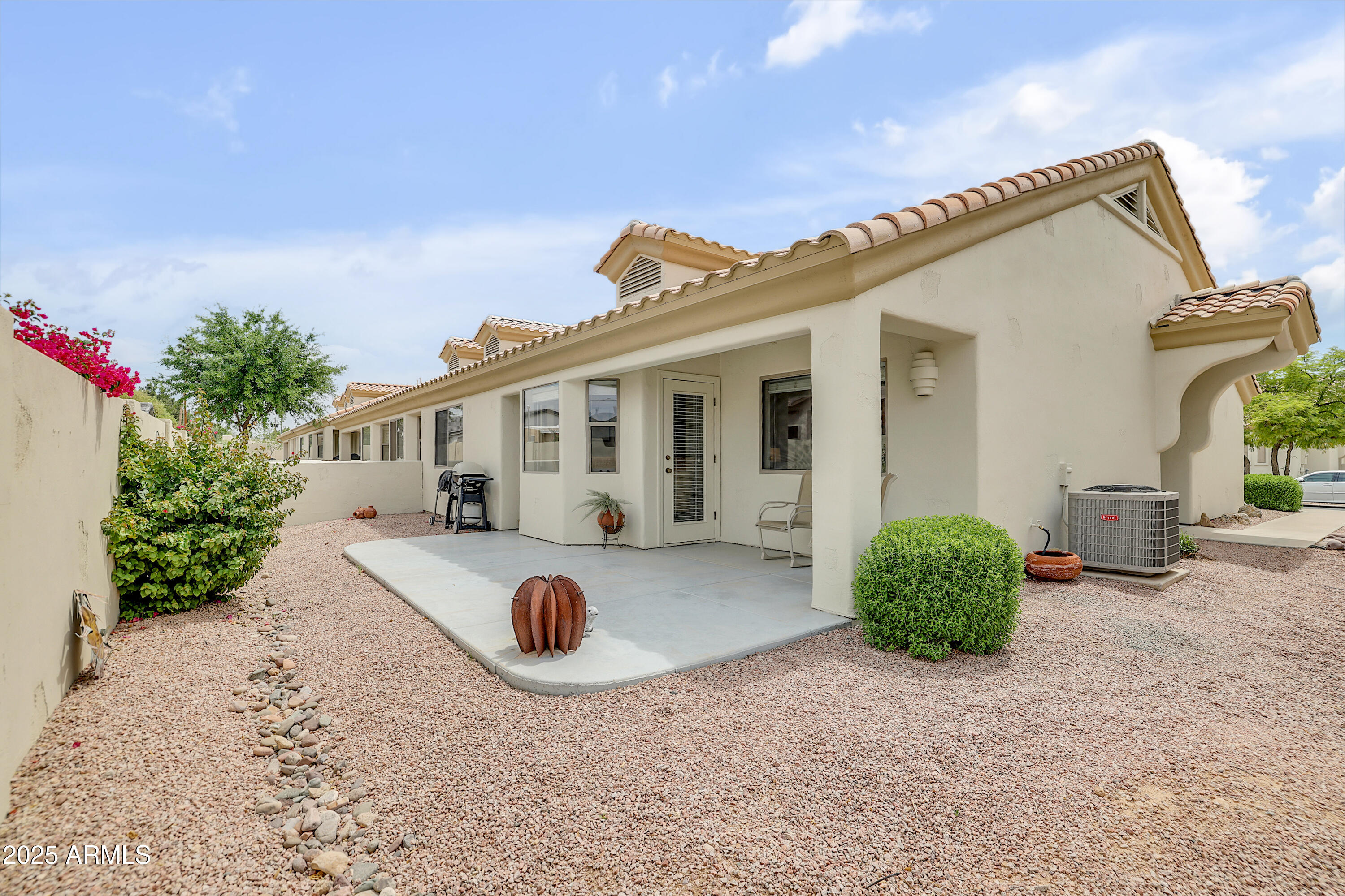 5830 East McKellips Road, Unit 30 Mesa, AZ 85215 - Photo 23 of 34 a view of a house with backyard
