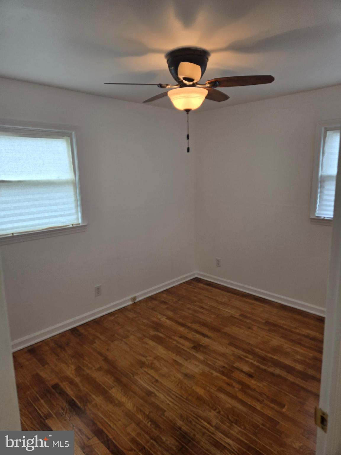 3245 Washington Road Parlin, NJ 08859 - Photo 25 of 59 a view of a room with wooden floor and window