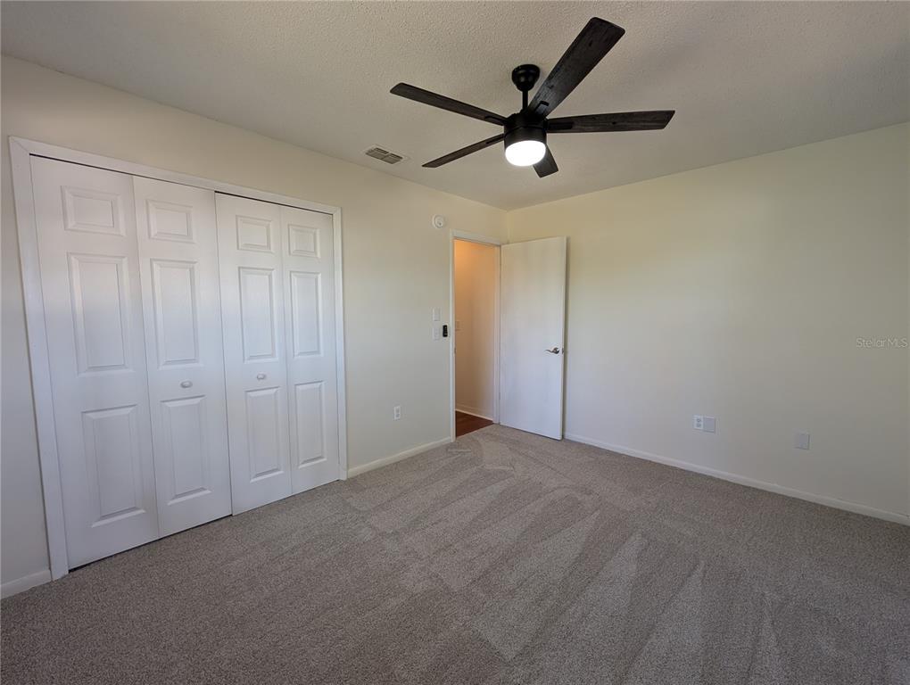 627 Prairie Lane Altamonte Springs, FL 32714 - Photo 22 of 32 an empty room with ceiling fan