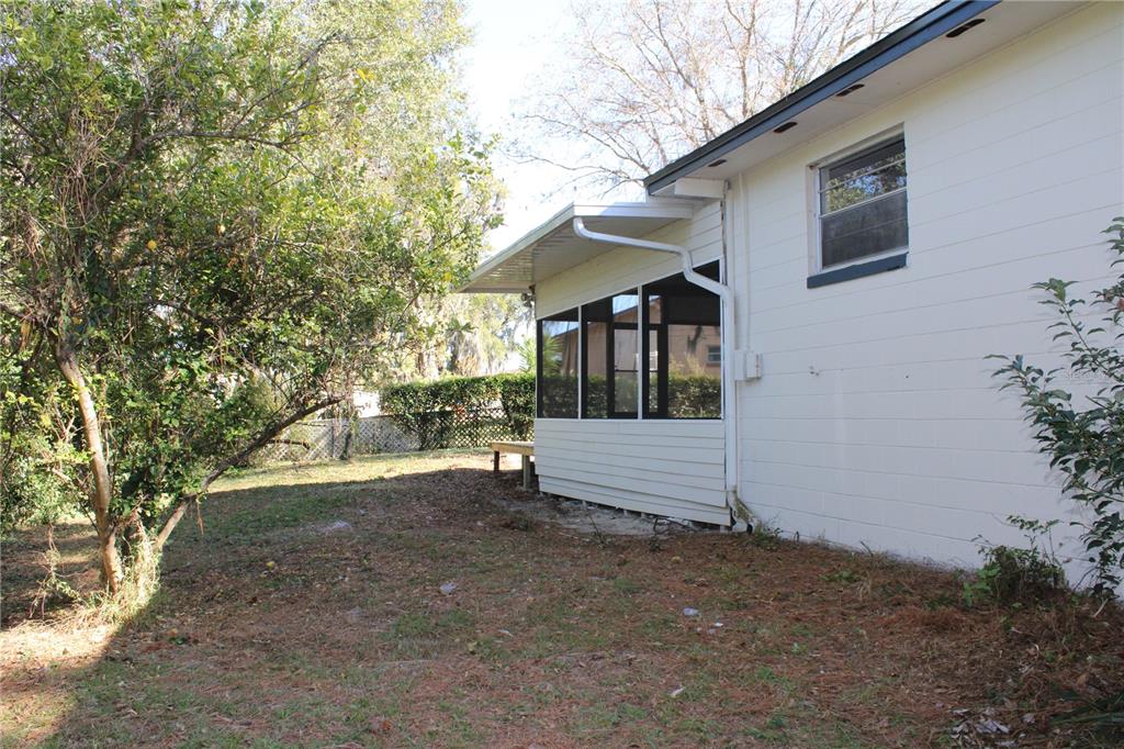 627 Prairie Lane Altamonte Springs, FL 32714 - Photo 31 of 32 a view of a house with a yard