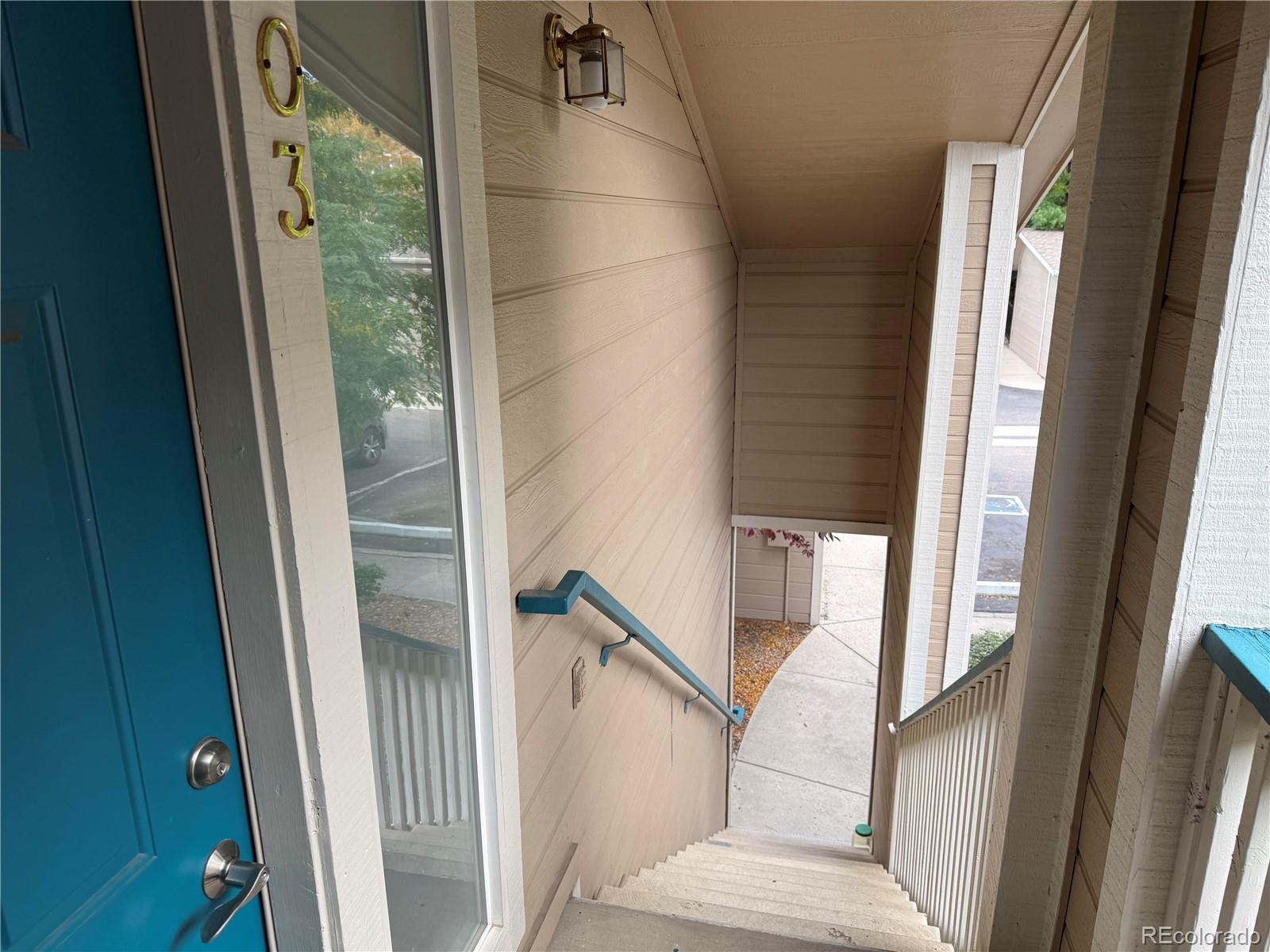 8415 Pebble Creek Way, Unit 203 Highlands Ranch, CO 80126 - Photo 2 of 36 a view of front door