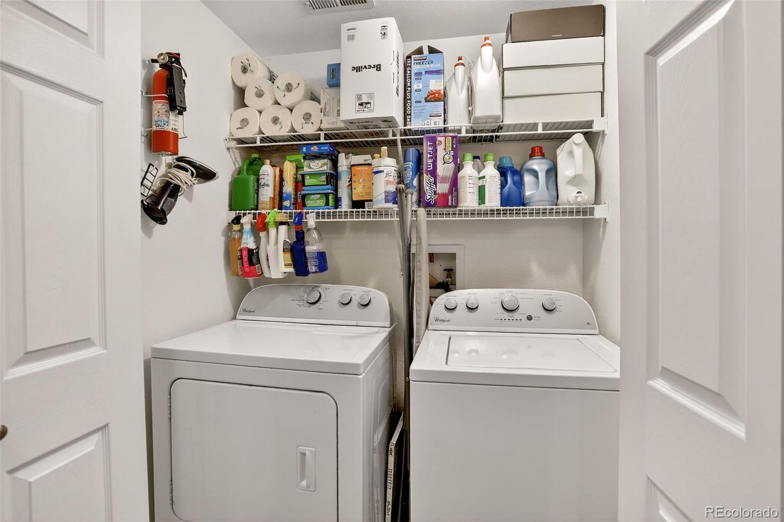8415 Pebble Creek Way, Unit 203 Highlands Ranch, CO 80126 - Photo 23 of 36 a utility room with dryer and washer
