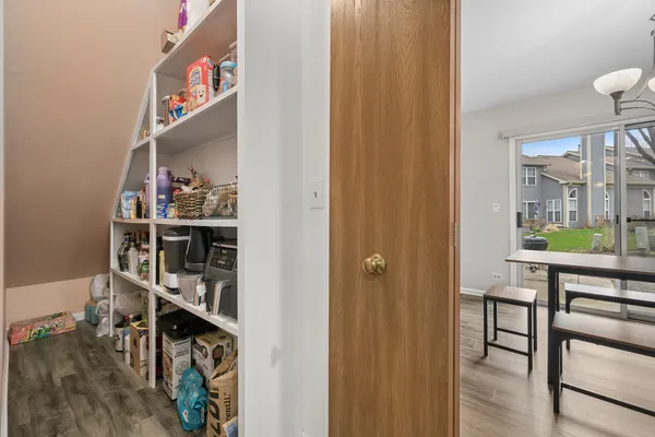a room with furniture and wooden floor