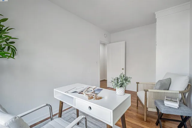 a workspace with furniture and window