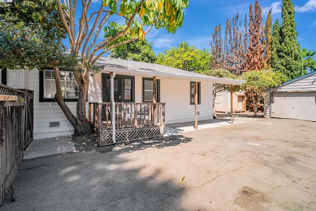a view of a house with a snow in a yard