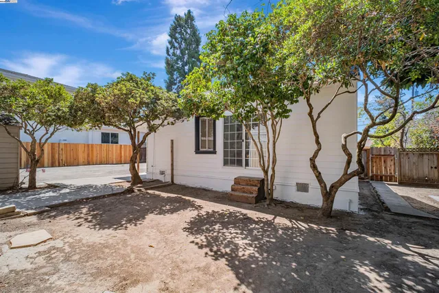 a backyard of a house with lots of green space