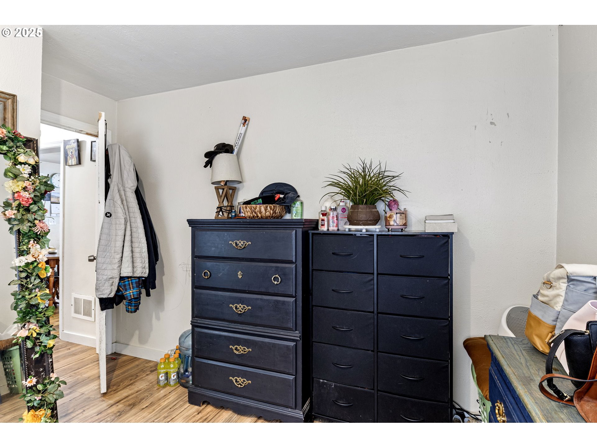350 Park Street Winston, OR 97496 - Photo 11 of 25 a bed room with a bed and a dresser