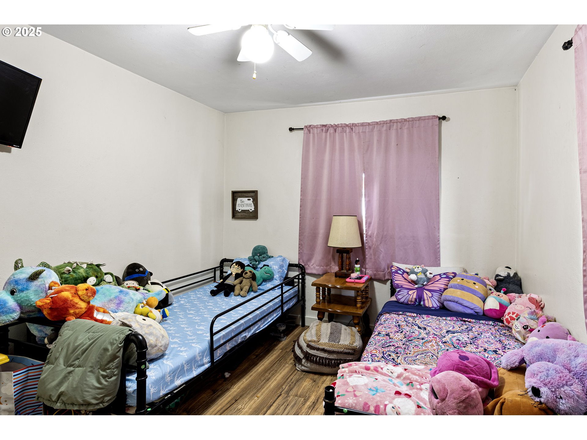 350 Park Street Winston, OR 97496 - Photo 15 of 25 a bed room with a bed mirror and a window