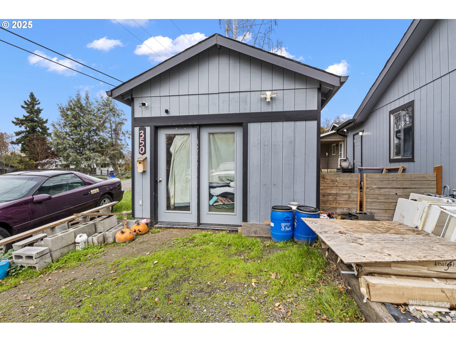 350 Park Street Winston, OR 97496 - Photo 18 of 25 a view of an house with backyard space and balcony