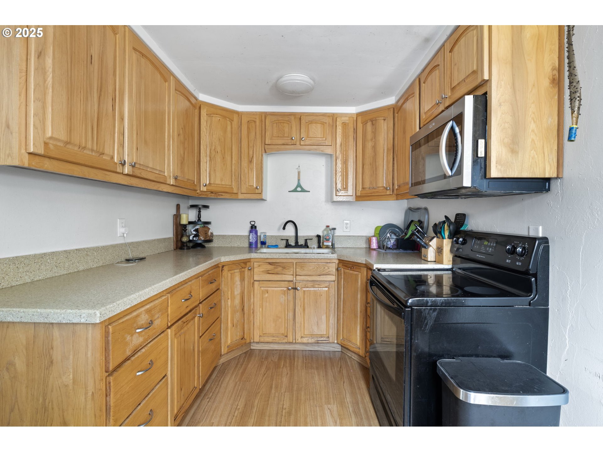 350 Park Street Winston, OR 97496 - Photo 6 of 25 a kitchen with stainless steel appliances granite countertop a sink stove and cabinets