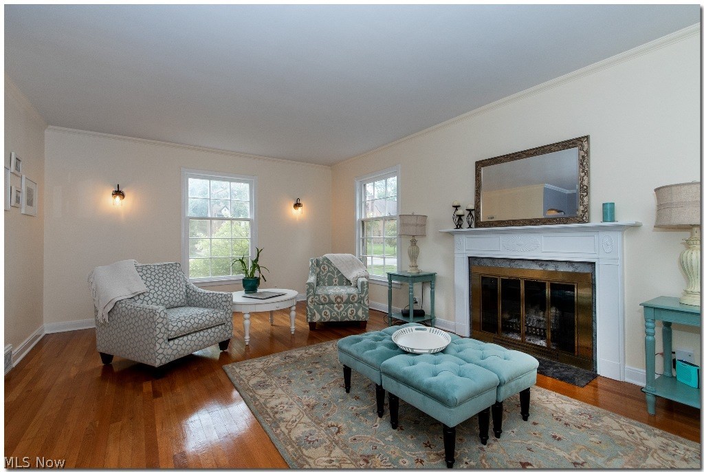 3626 Sutherland Road Shaker Heights, OH 44122 - Photo 5 of 26 Spacious Living Room with Gleaming Hardwood Floors and Fireplace