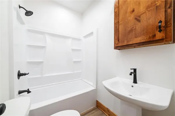a bathroom with a sink and a bathtub
