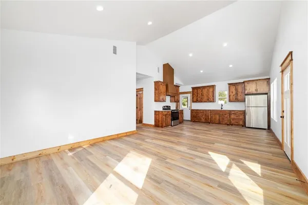 a view of a kitchen with a sink