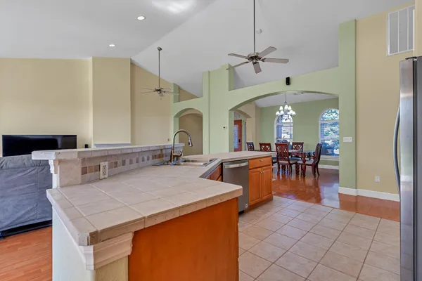 a room with gym equipment and a rug