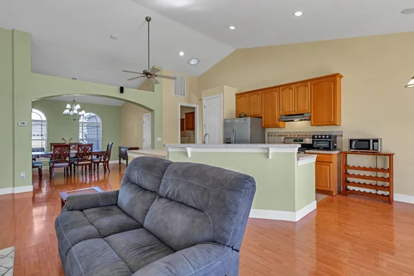 a bedroom with furniture and a window