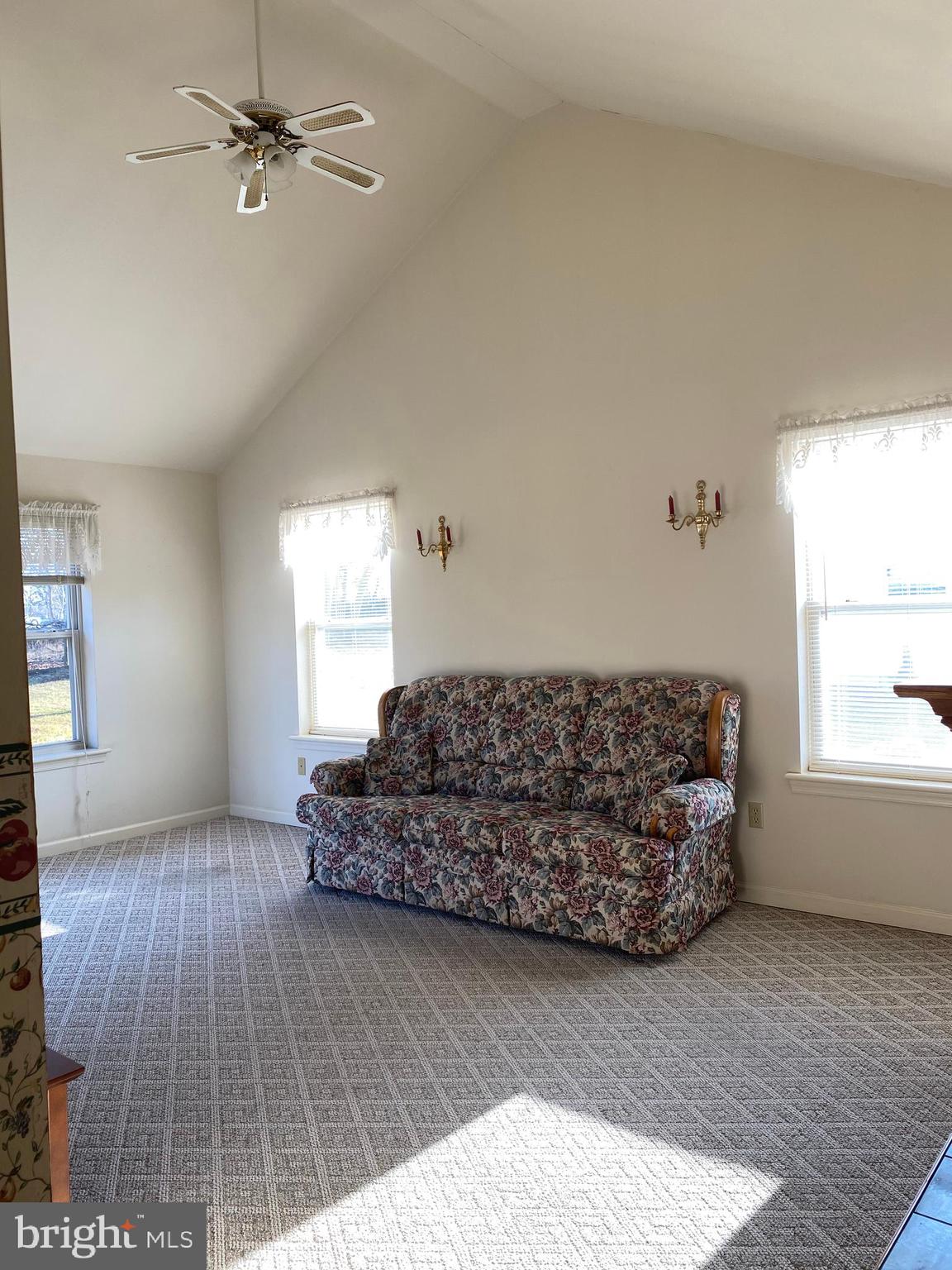 905 Chatfield Road Warrington, PA 18976 - Photo 14 of 36 family room with vaulted ceiling and fan