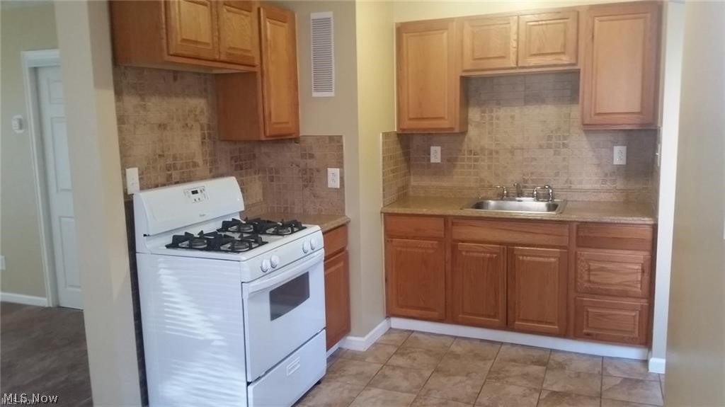 4050 Fulton Road Cleveland, OH 44144 - Photo 10 of 19 Kitchen with stove.