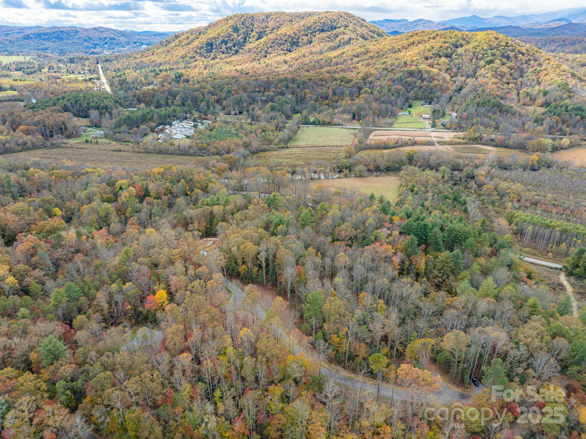 0 Reserve Way, Unit 11 Hendersonville, NC 28792 - Photo 33 of 48 a view of a town with mountains in the background