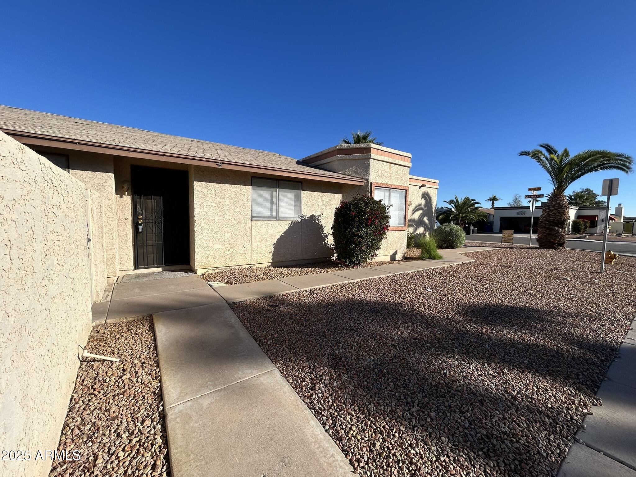 2120 North Yucca Court Chandler, AZ 85224 - Photo 2 of 32 a view of a house with a porch
