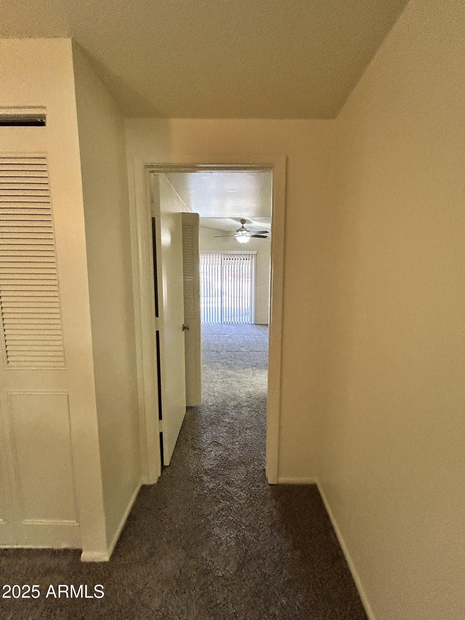2120 North Yucca Court Chandler, AZ 85224 - Photo 25 of 32 a view of a hallway with wooden floor