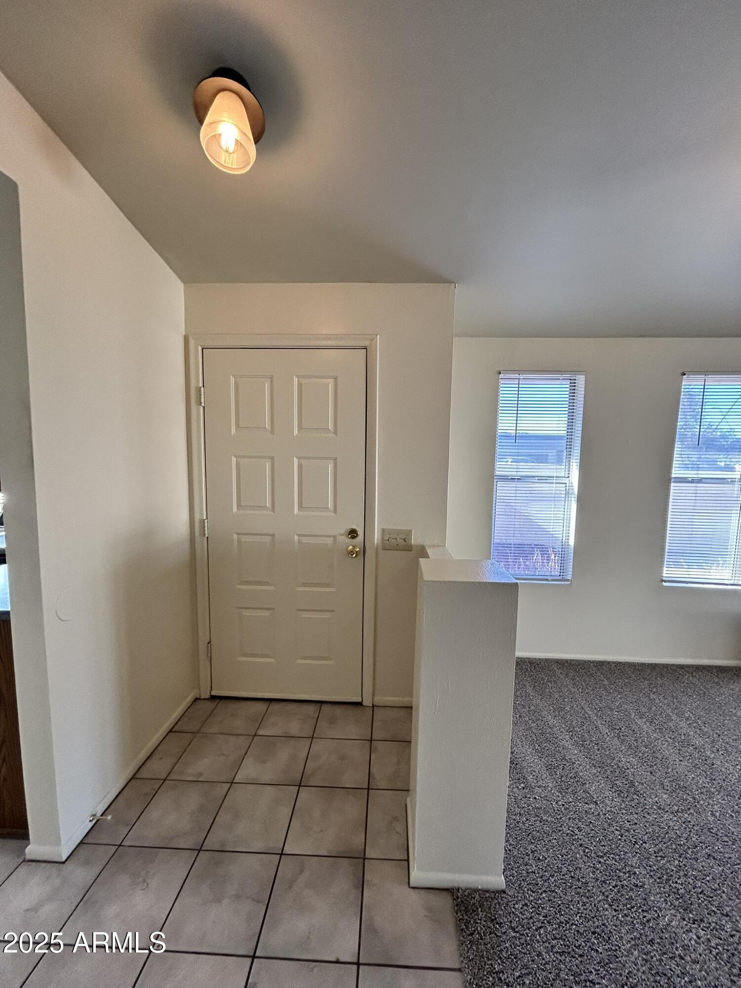 2120 North Yucca Court Chandler, AZ 85224 - Photo 4 of 32 an empty room with windows