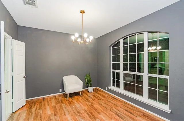 a view of a room with windows