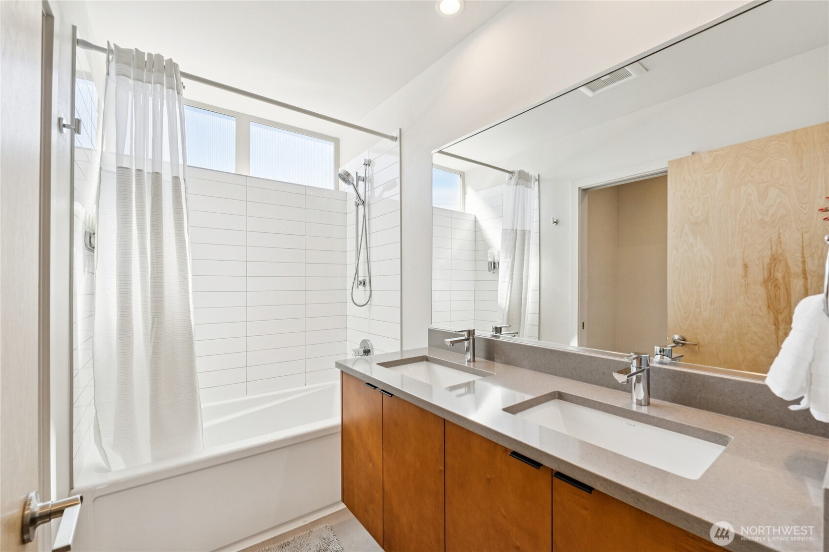 1432 South King Street Seattle, WA 98144 - Photo 12 of 28 a bathroom with a double vanity sink mirror and double