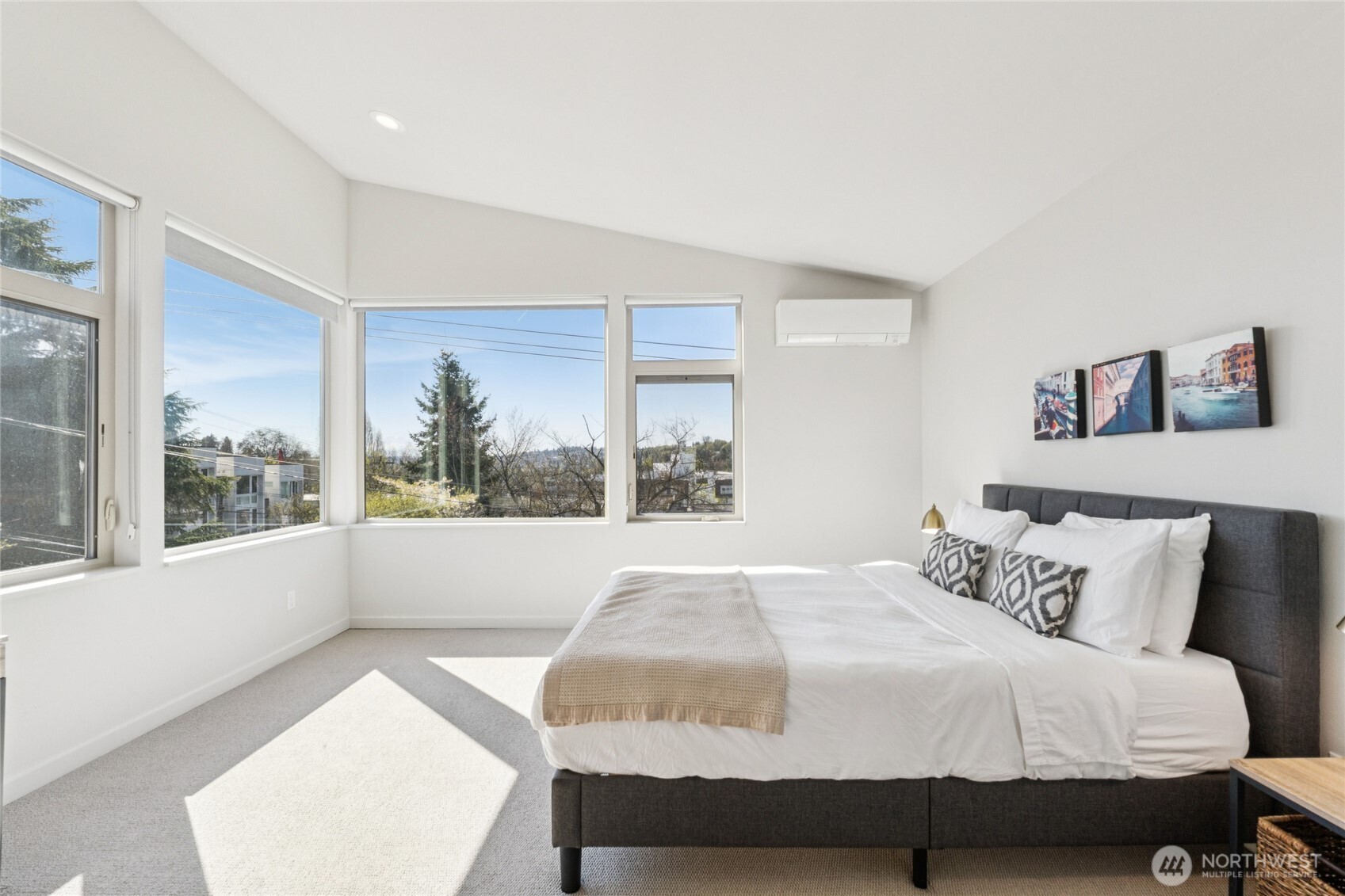 1432 South King Street Seattle, WA 98144 - Photo 10 of 28 a bedroom with a large bed and a window