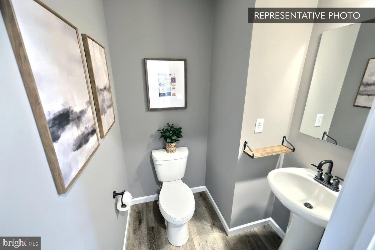 141 Redbud Road Bellefonte, PA 16823 - Photo 5 of 20 a bathroom with a toilet sink and a mirror