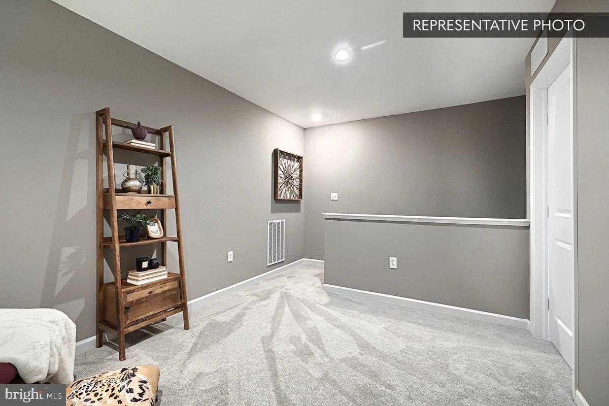 141 Redbud Road Bellefonte, PA 16823 - Photo 10 of 20 a bedroom with a bed and cabinets