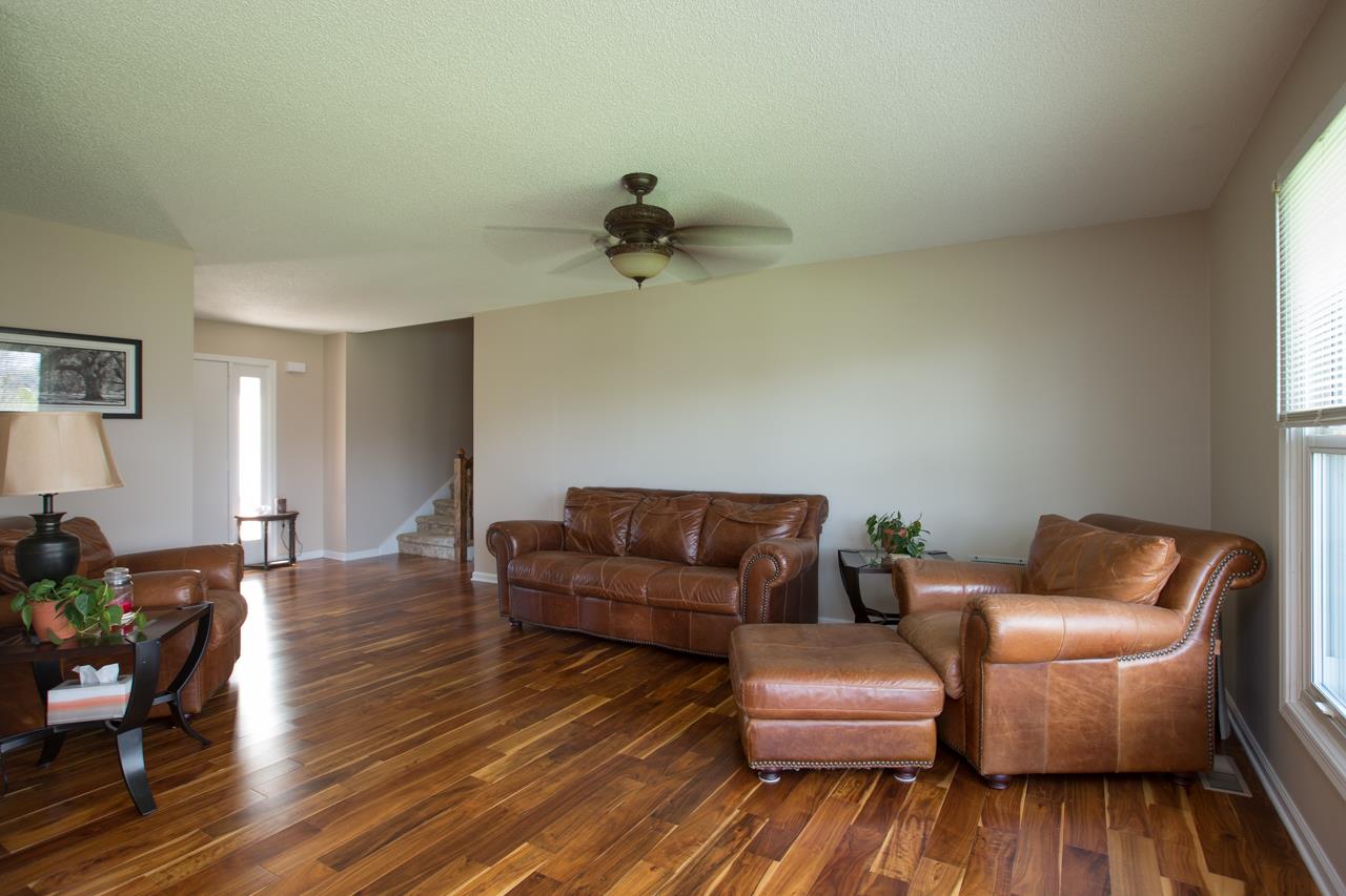 Walk through the front door into the spacious and inviting living room.