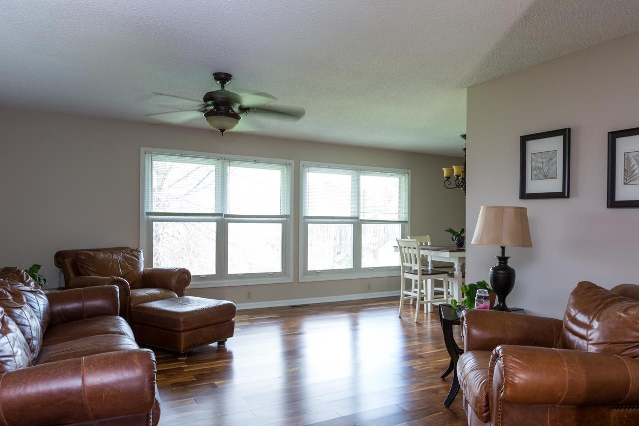 165 Rorrer Circle Harrisonburg, VA 22801 - Photo 8 of 27 Large windows allow natural light to flood into the living room, which opens into the dining room, creating a nice flow on the main level.