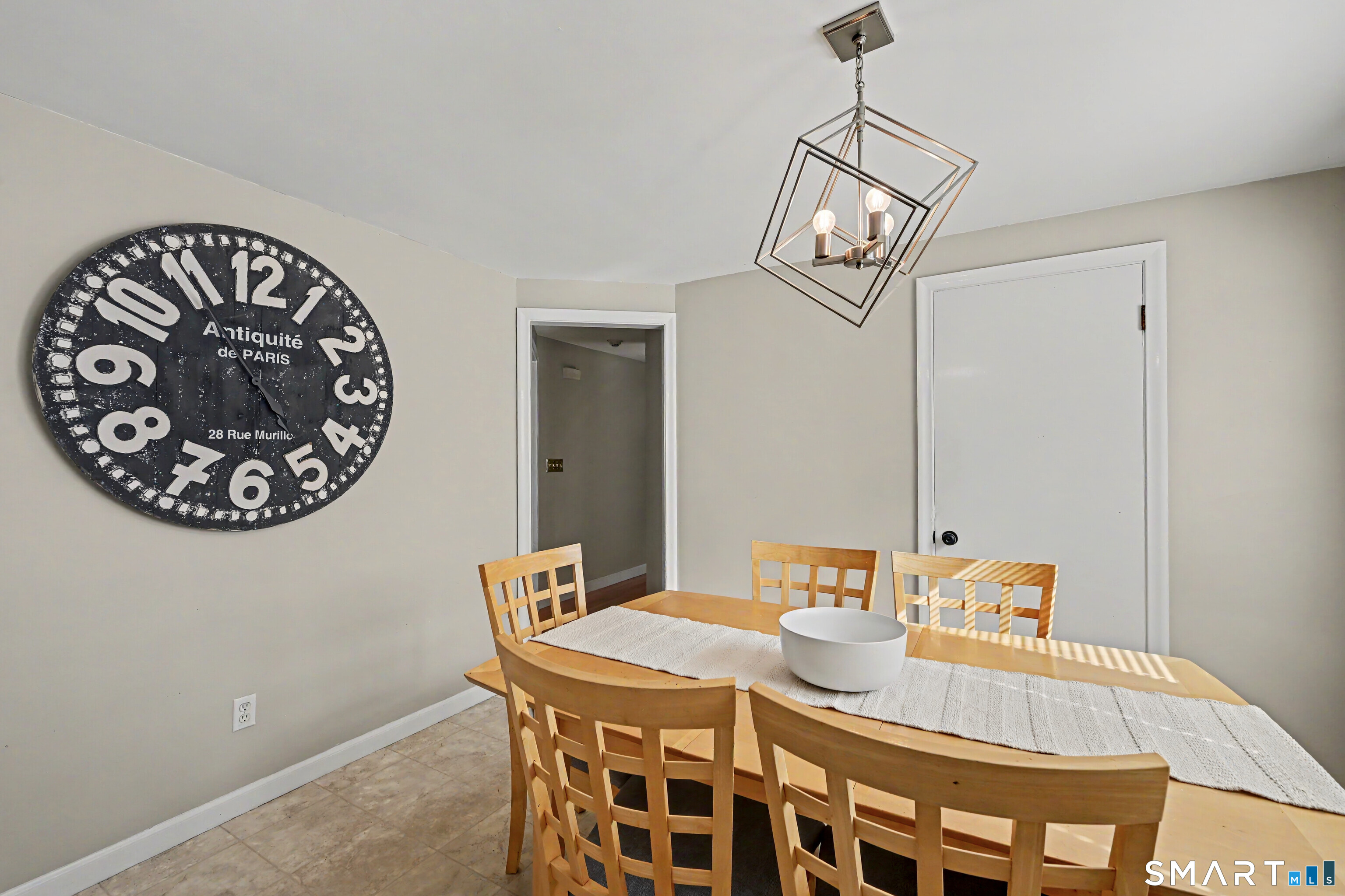 524 Ferry Road Orange, CT 06477 - Photo 14 of 40 a view of a dining room with a table and chairs