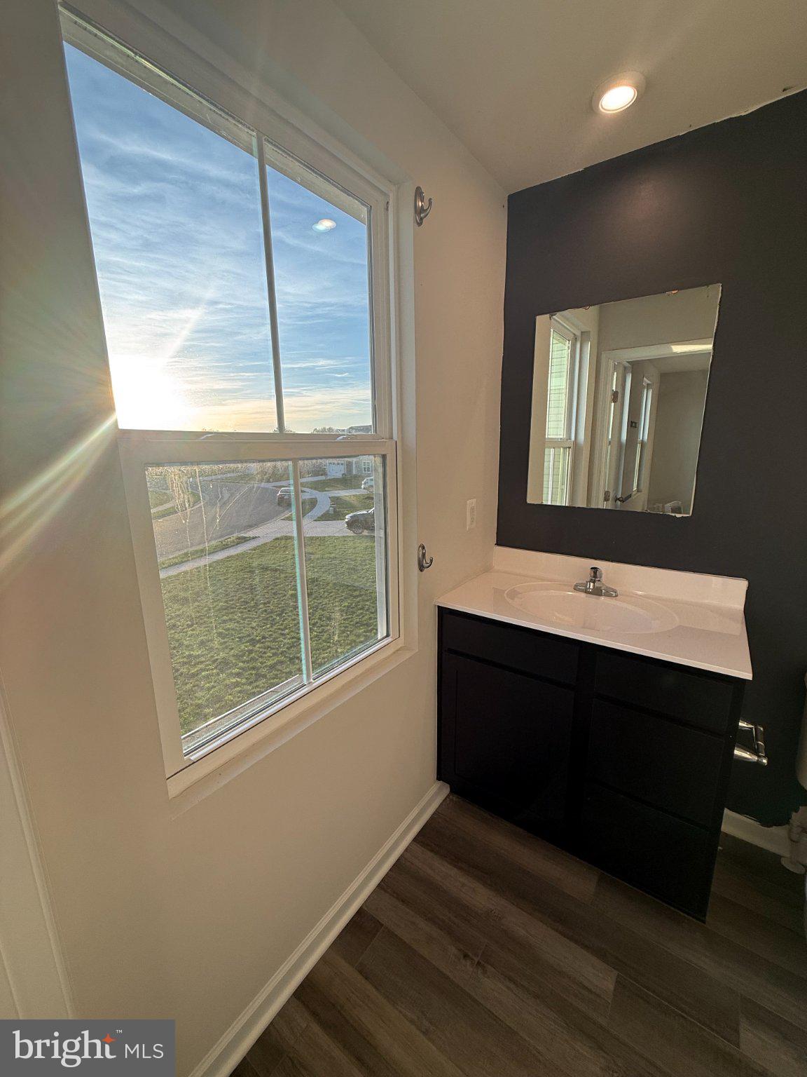 110 Mariners Way Cambridge, MD 21613 - Photo 12 of 22 Sunlit bathroom with modern elegance.