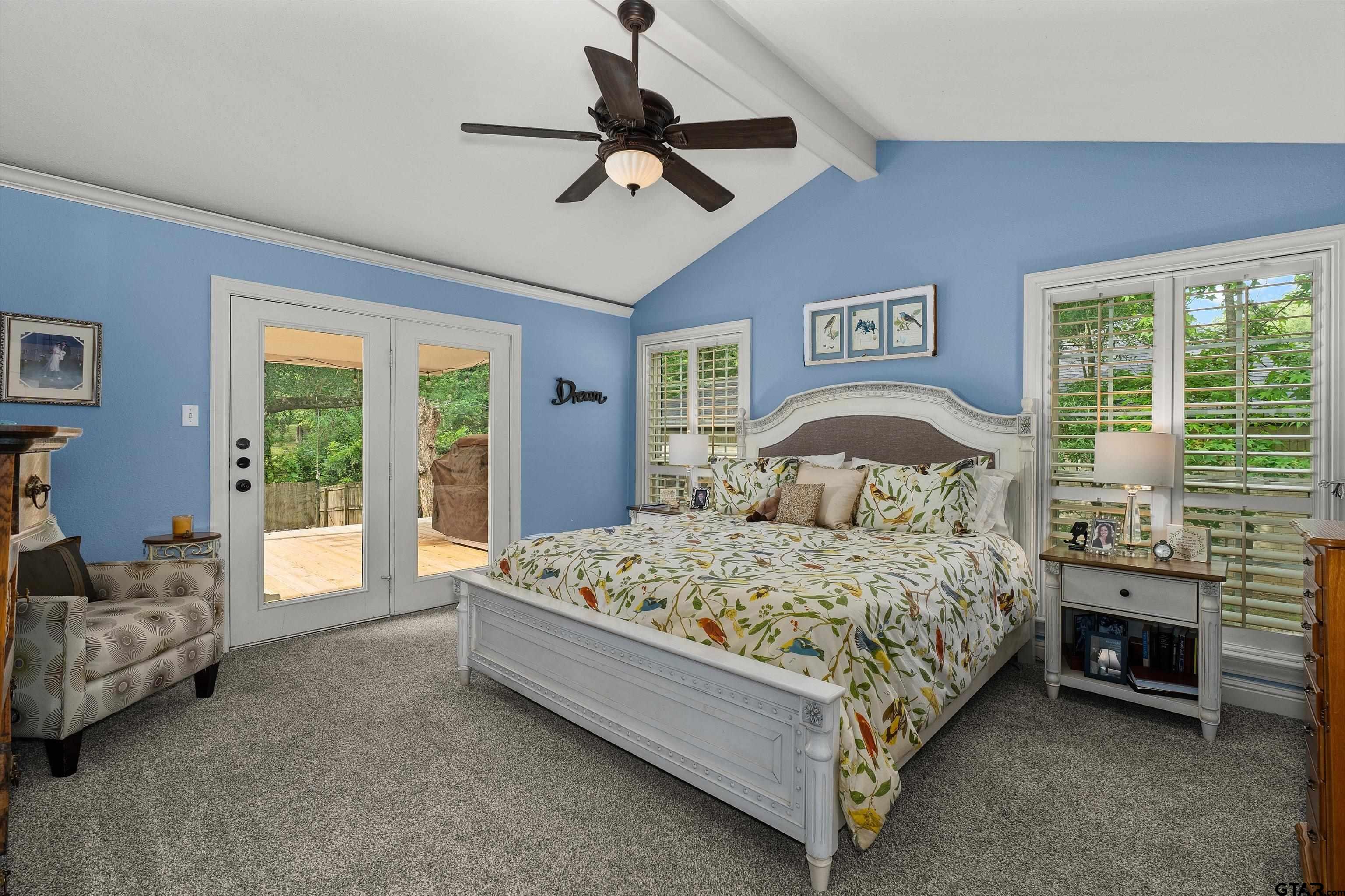 16 Pegues Place Longview, TX 75601 - Photo 25 of 45 a bed sitting in a spacious bedroom next to a window