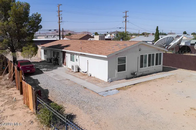 a aerial view of a house with a sink and roof