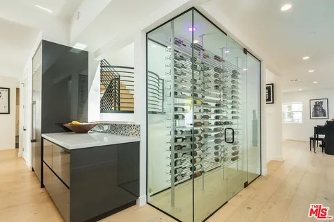 a bathroom with a shower and a sink