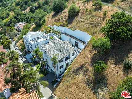 a view of balcony with wooden floor