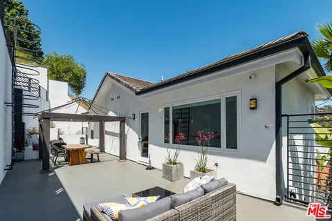 a view of a house with a patio