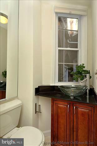 2719 Ontario Road Northwest Washington, DC 20009 - Photo 13 of 30 Main level half bath
