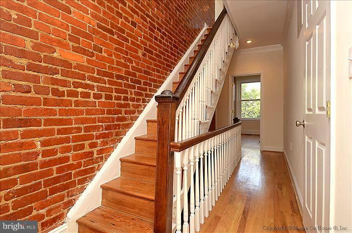 2719 Ontario Road Northwest Washington, DC 20009 - Photo 19 of 30 Hallway and stairs to third level