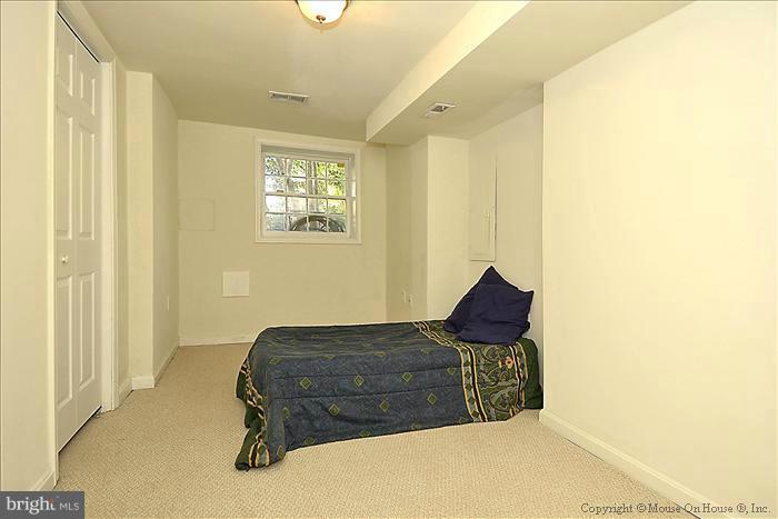 2719 Ontario Road Northwest Washington, DC 20009 - Photo 3 of 30 Lower level front bedroom