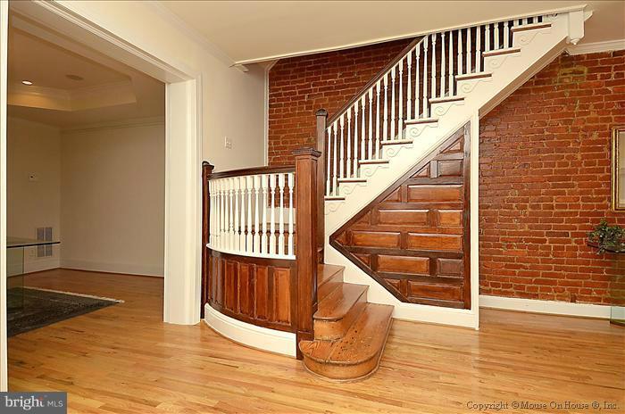 2719 Ontario Road Northwest Washington, DC 20009 - Photo 24 of 30 Stairs with curved railing