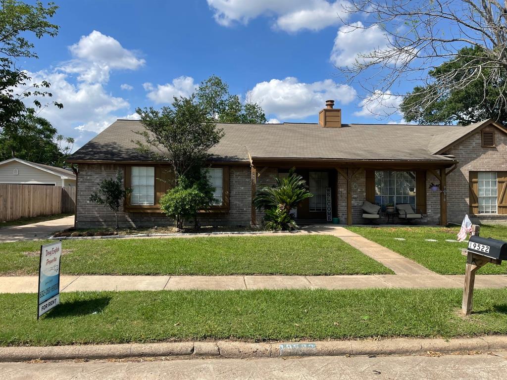 19522 Lazy Valley Drive Katy, TX 77449 - Photo 1 of 11 a front view of a house with garden