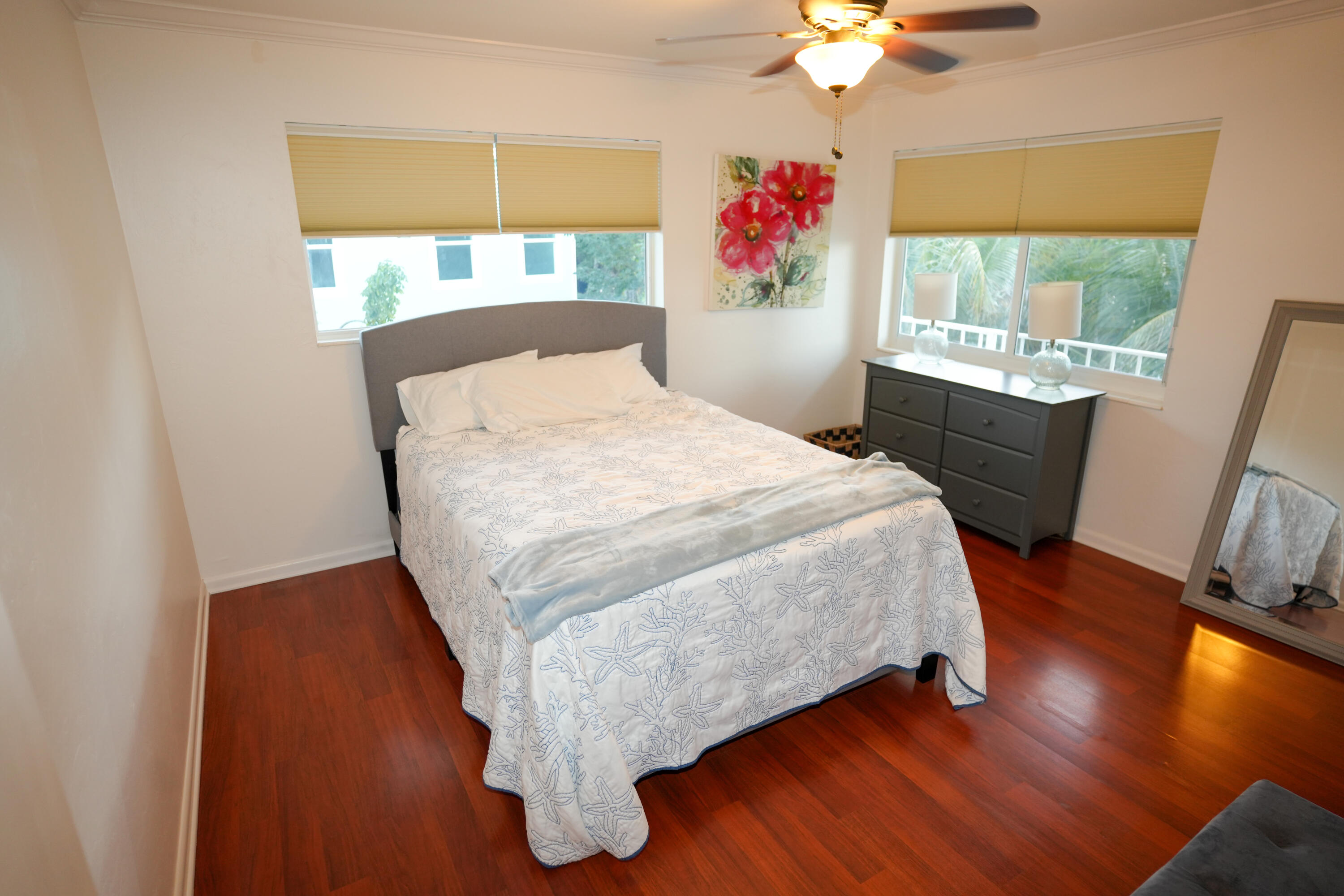 210 Schooner Lane Duck Key, FL 33050 - Photo 17 of 38 a bed sitting in a bedroom next to a window