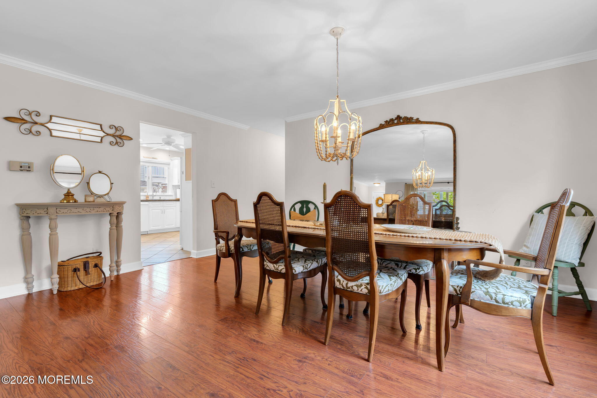 29 Green Island Road Toms River, NJ 08753 - Photo 15 of 63 a view of a dining room with furniture a chandelier and wooden floor