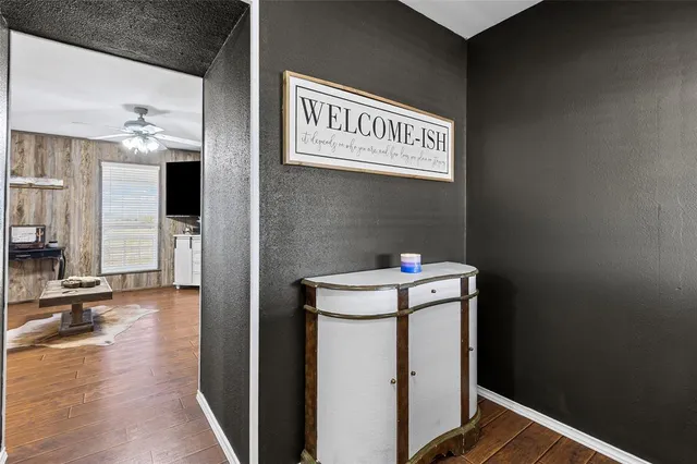 a view of workspace with window and ceiling fan