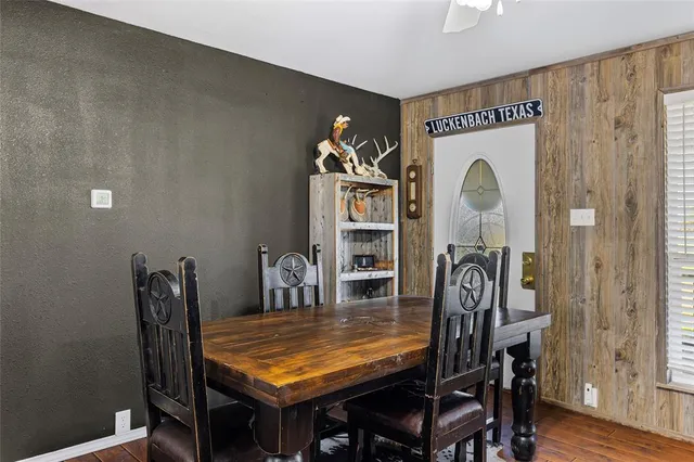 a view of a dining room with furniture
