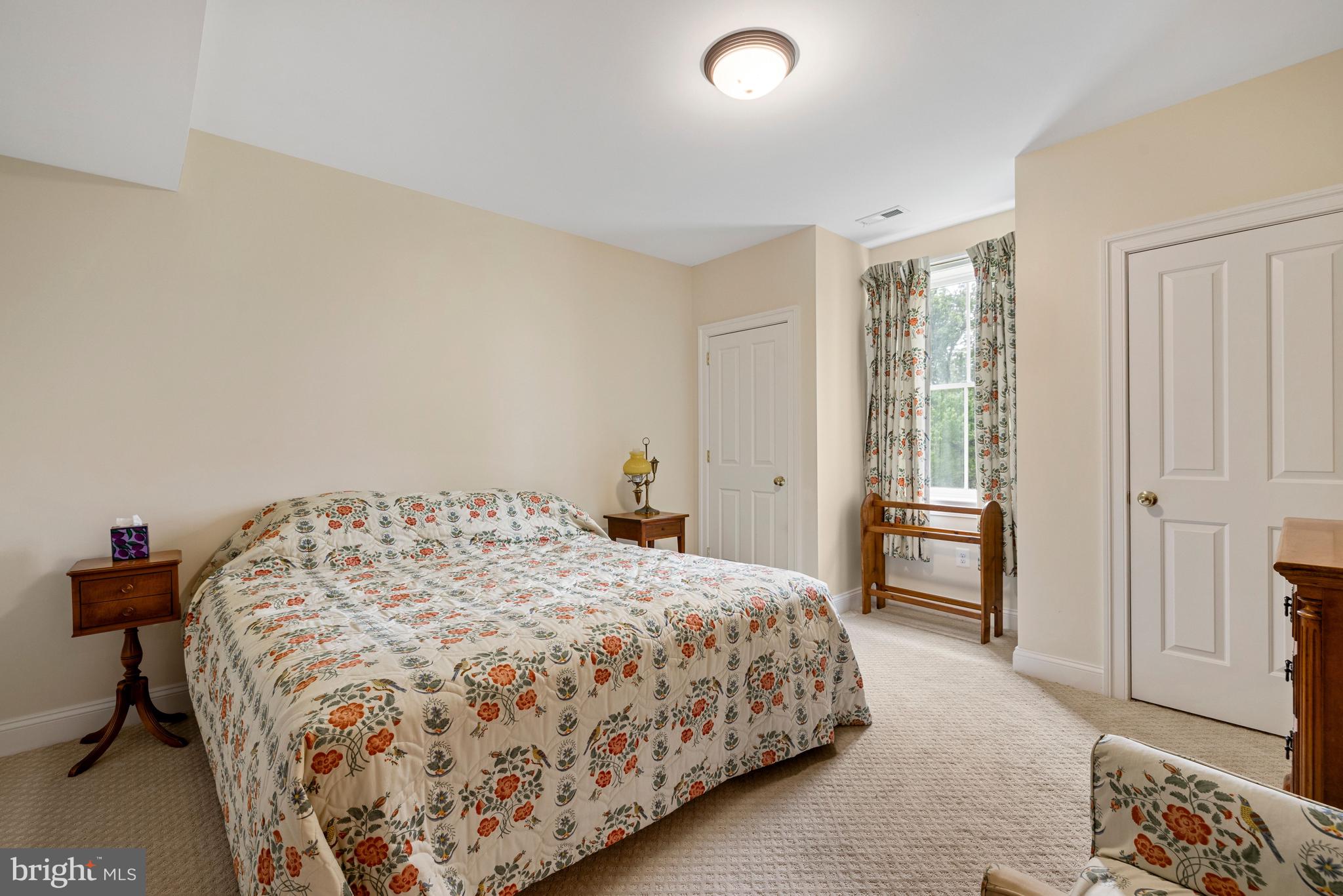 20147 Woodtrail Road Round Hill, VA 20141 - Photo 34 of 41 a bedroom with a bed and a window